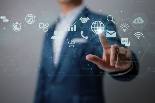 Businessman is using a digital vitual screen with charts on it. The concept of global business.