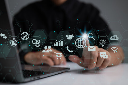 Businessman is using a digital vitual screen with laptop computer. The concept of global business.