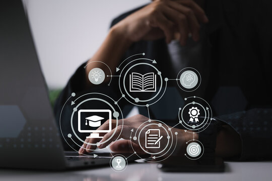 E-learning concept: A person is using a laptop computer to learn.