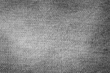Black and grey denim background. Detailed texture of black and grey denim fabric. © Maksim