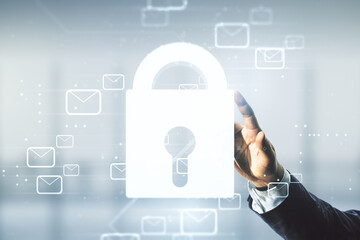 Man hand clicks on abstract virtual lock illustration with postal envelopes on blurred office background, cyber security and email protection concept. Multiexposure