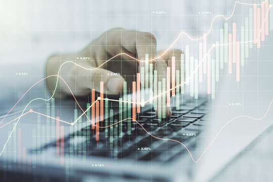 Multi exposure of abstract creative financial chart with hand typing on computer keyboard on background, research and analytics concept