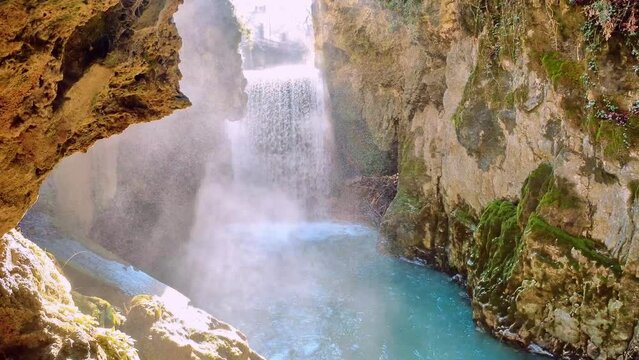 crystal clear stream running through a pristine valley in the town of Pioraco in the Marche region, Italy