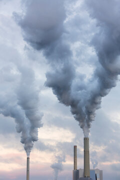 Smoke stack of a coal power station causing global warming