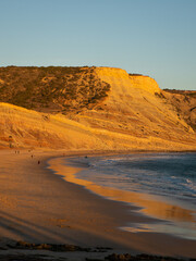 Fototapeta na wymiar Praia da Luz beach at sunset, close to Lagos, Algarve region, Portugal