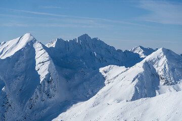 snow covered mountains, Negoiu Peak, viewpoint from Museteica Peak, Fagaras Mountains, Romania 