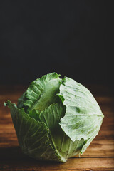 Whole White Cabbage on Wooden Table