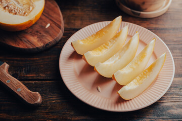 Sliced Sweet Yellow Melon on Plate
