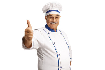 Mature male chef smiling and showing a thumb up gesture