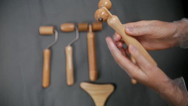 Different wooden tools and rollers for face massaging