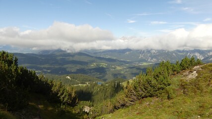 Fototapeta premium View of the landscape below the peaks of the Alps - Seefeld in Tyrol, Austria.
