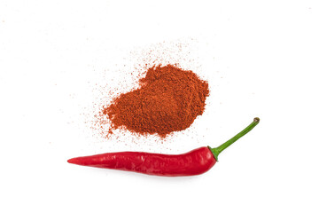 Fresh and powdered paprika, red pepper isolated on a white background