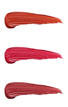 Set of colorful textured lip gloss strokes isolated on white background closeup