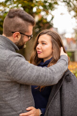 Happy young european married couple portrait in fall
