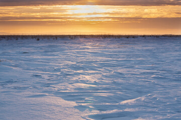 Orange sunset over a snowy blue field.Natural background - 482201114