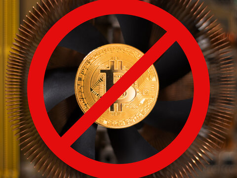 Prohibition sign No Bitcoin. Cryptocurrency ban concept. News about ban of cryptocurrency and mining in the world. Danger risk of global warming due to cryptocurrency mining.