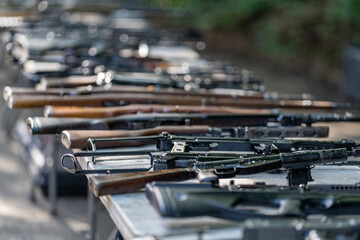 collection of historical and modern weapons on the shooting range
