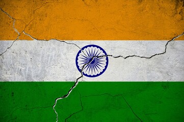 Fototapeta na wymiar An image of the India flag on a wall with a crack.