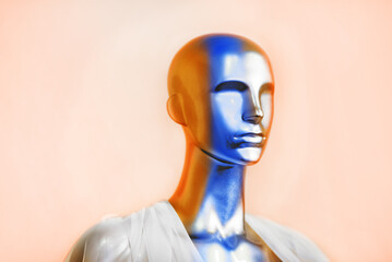 Colored mannequin close-up on a light background with copy space.