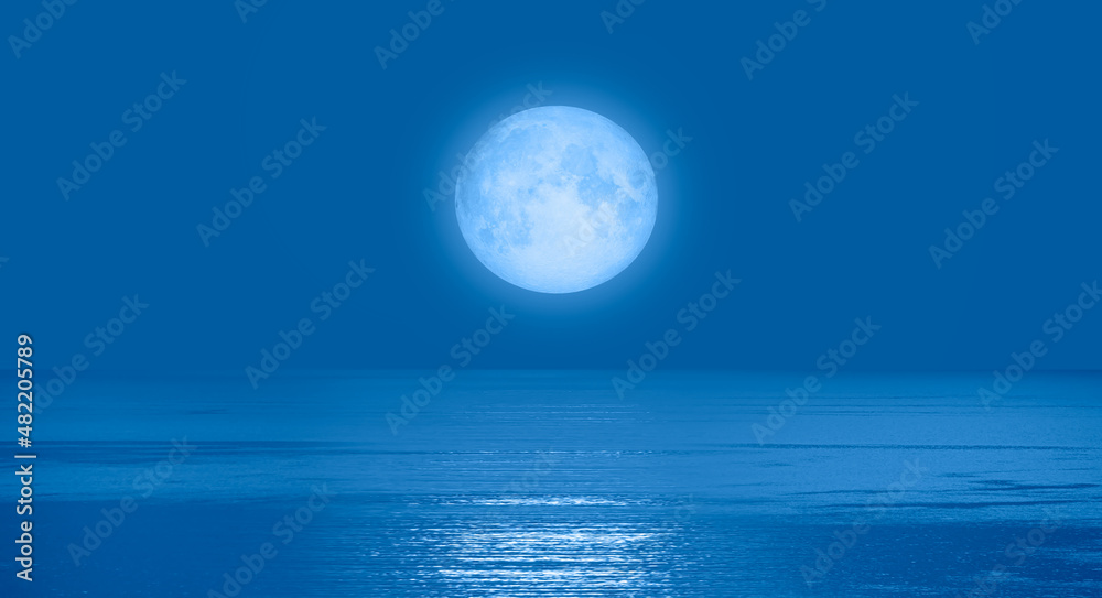 Poster night sky with full bright moon in the clouds 