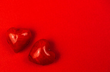Valentines Day with two red hearts on a red background, Flat lay, copy space photo