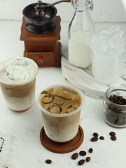 Iced coffee with milk, chocolate syrup and ice