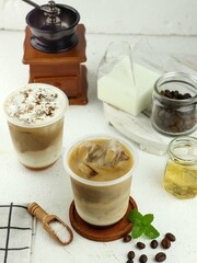 Iced coffee with milk, chocolate syrup and ice