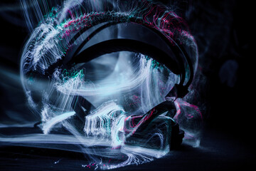 Neon cyber futuristic headphones on the dark background