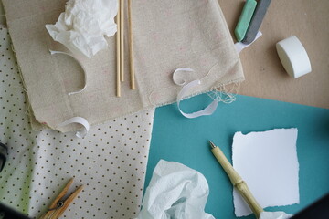 Background with writing paper in zero waste color. Brown and blue colors, white paper, natural...