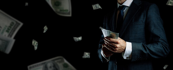 Money stack. Business man hand holding American money. Washington cash, usd falling banner. - obrazy, fototapety, plakaty