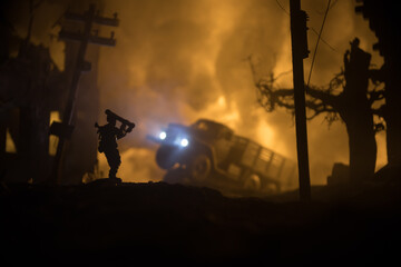 Military soldier silhouette with bazooka. War Concept. Military silhouettes fighting scene on war fog sky background, Soldier Silhouette aiming to the target at night.