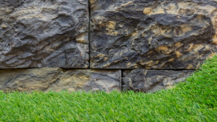 A Section of Artificial Grass for a Product Display, Showing the Horizontal Ridge Line Leading to a...