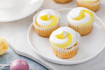 Lemon cupcakes for Easter on a white plate