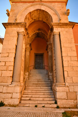 The entrance door in the bell tower of an ancient church in Gaeta, an Italian town in the Lazio region.
