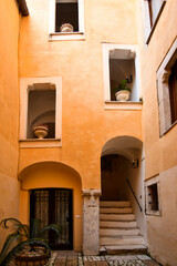 Fototapeta na wymiar An old building in the medieval quarter of Gaeta, an Italian town in the Lazio region.