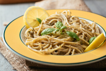 Spaghetti with a home made lemony kale and walnut pesto.