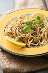 Spaghetti with a home made lemony kale and walnut pesto.