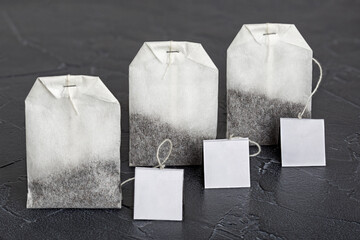 Tea bags with herbs for tea on the table.