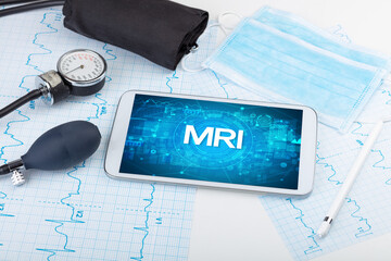 Close-up view of a tablet pc with medical abbreviation