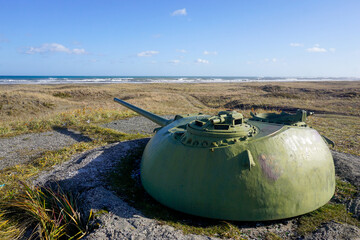 Old anti-aircraft guns off the coast on Sakhalin Island