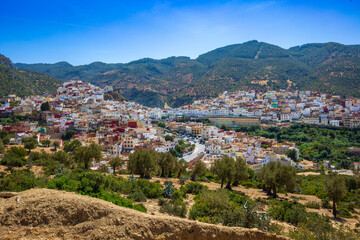 Fototapeta na wymiar Moulay Idriss is a town in the Fes-Meknes region of Northern Morocco, spread over two hills at the base of Mount Zerhoun.