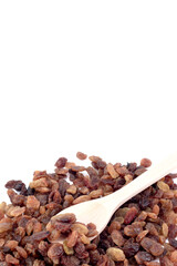 Dried grapes, raisins on a white background. Banner, place for text.