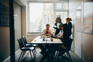 Businesspeople talking together in a meeting