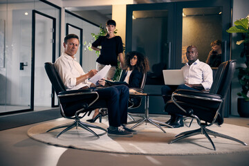 Confident businesspeople working in an office