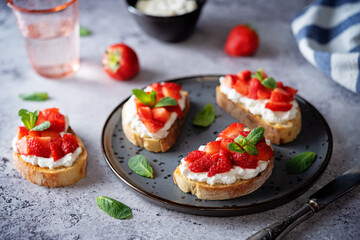 Strawberry ricotta sandwiches with mint leaves