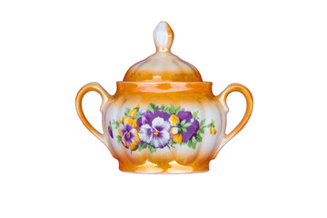 Traditional ceramic sugar bowl decorated with floral motifs isolated over white 