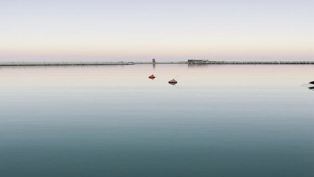 sky sea horizon with buoy at sunset 
