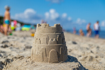 Sand buildings on the beach in Krynica Morska during beautiful sunny day at the Baltic sea.