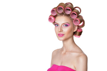 portrait of beautiful woman with hair curlers