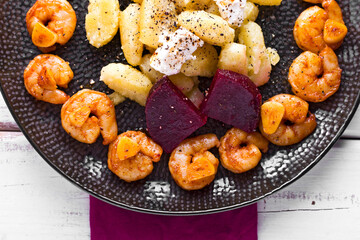gnocchi with prawns and beetroot